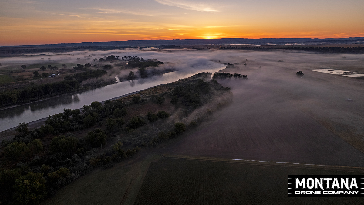 foggy morning on the yellowstone river montana aerial photograph