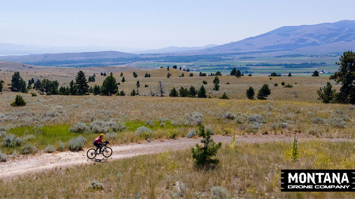 Mountain Biking Pictures August Monthly Photo Contest Montana Drone Company Logo